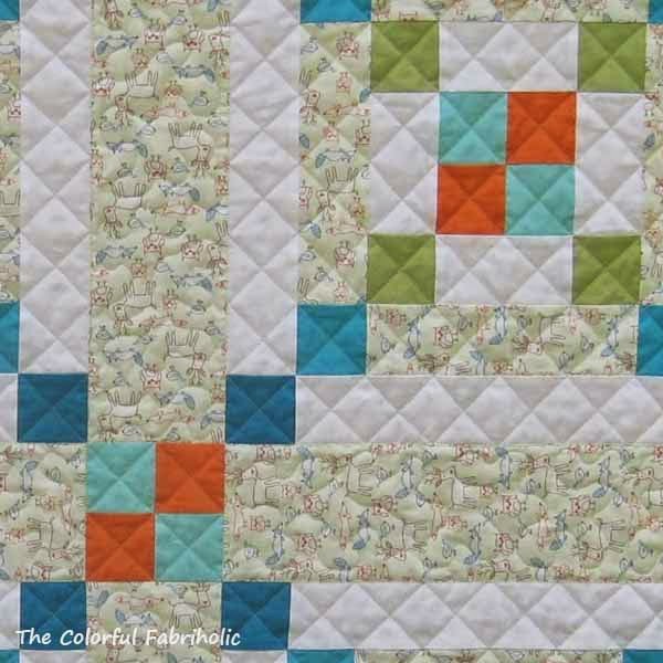 The Colorful Fabriholic A Finish and a Tutorial Chain of Love Baby Quilt