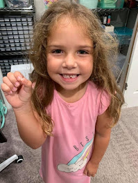 Look who lost her first tooth!