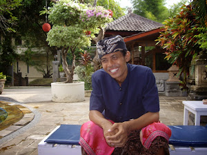 KOMANG LAUGHING AT WORK--THE GORGEOUS BALINESE PERSONALITY