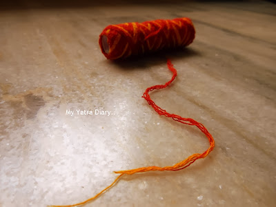 Raksha Bandhan tradition - red thread or moli