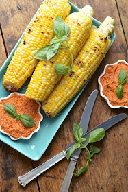 Sweet and tender grilled corn with tomato basil "butter" - vegan recipe