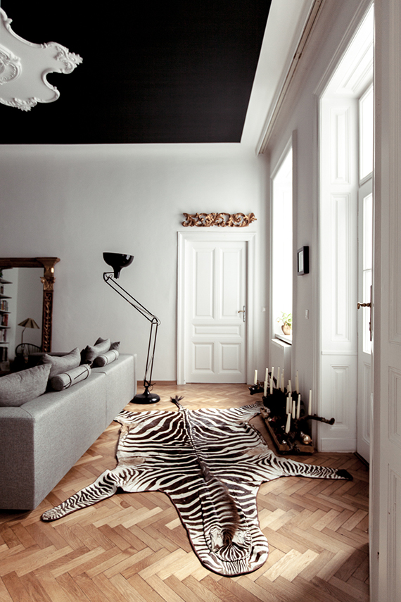Black ceiling and herringbone floors | Atelier Karasinski