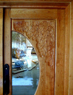Ely MN carved doors, https://www.huismanconcepts.com/