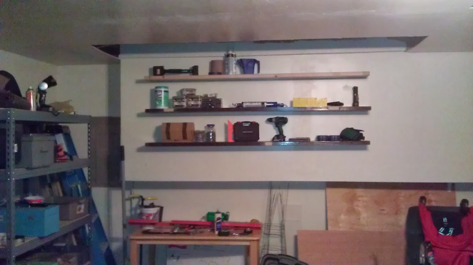 The Amos School of Construction The Floating Garage Shelves