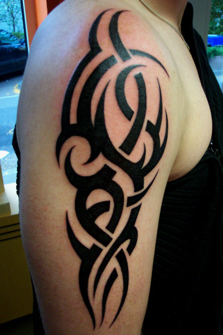 Tattoo Information Point: Right Arm Tribal Tattoo