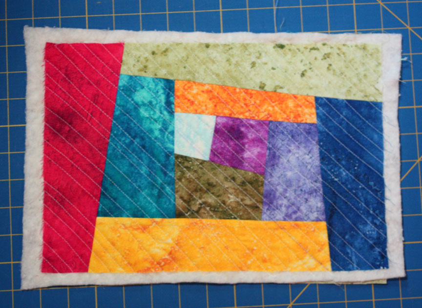 Inspired by Fabric Wonky Log Cabin Mug Rug Tutorial