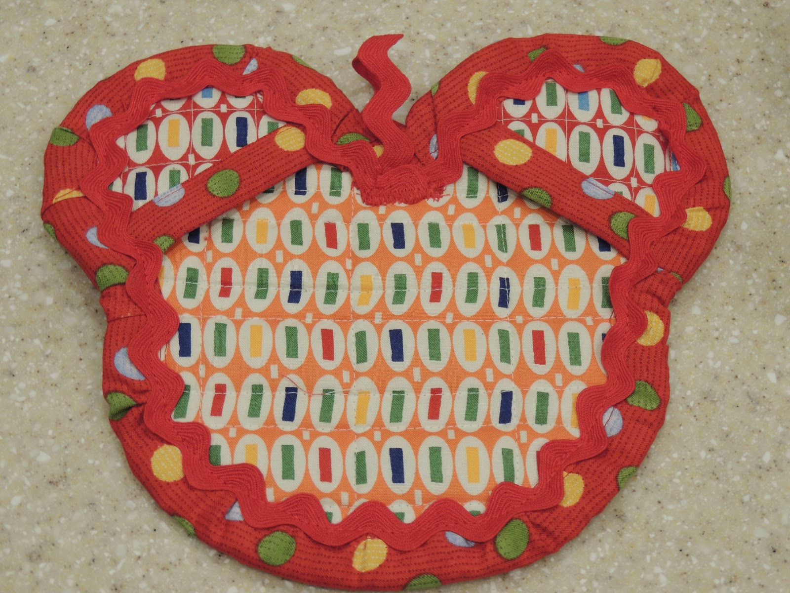 Seriously..I think it needs stitches. Mickey Mouse Hot Pad