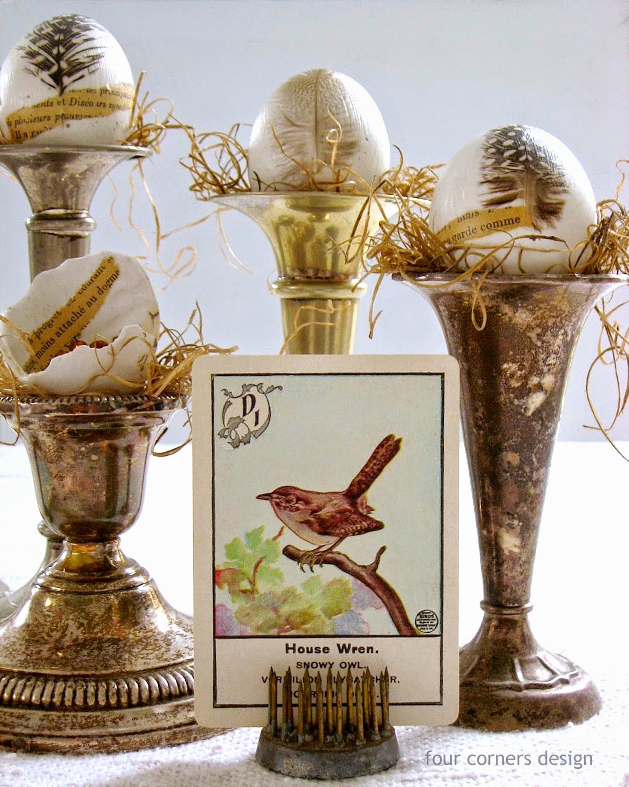 Feather embellished Easter eggs by  Four Corners Design featured on I Love That Junk