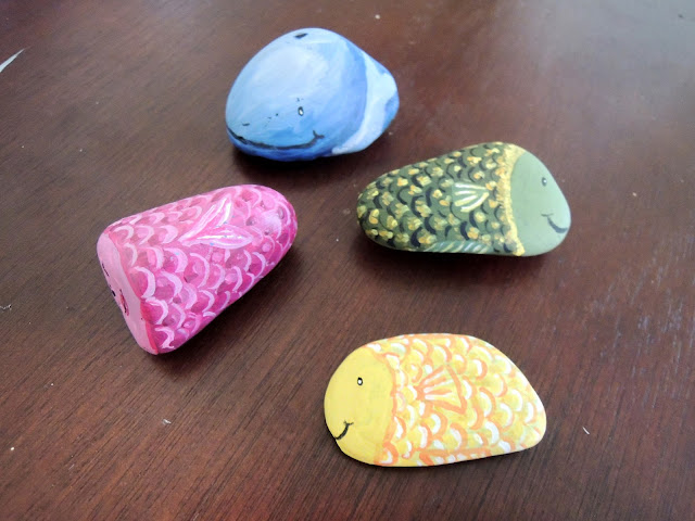 Painted fish stones