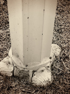 BASE OF OLD LIGHT POST'S ON STREET