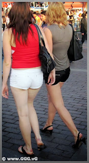 Girls in black and white shorts on the street