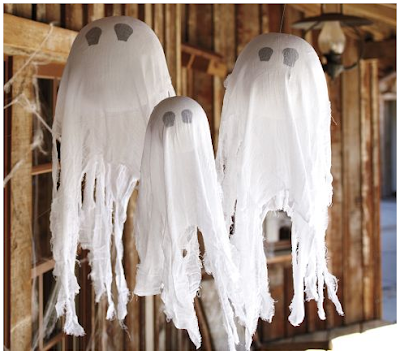 Want to know how to make hanging ghosts from Pottery Barn for a lot less than you can buy them for? Here's a Pottery Barn knock-off that makes the perfect not-so-spooky Halloween decor for your front porch!