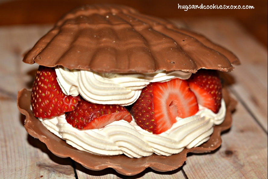 CHOCOLATE SHELL FILLED WITH STRAWBERRIES & WHIPPED CREAM Hugs and
