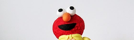 Header picture of Elmo on Potty cake