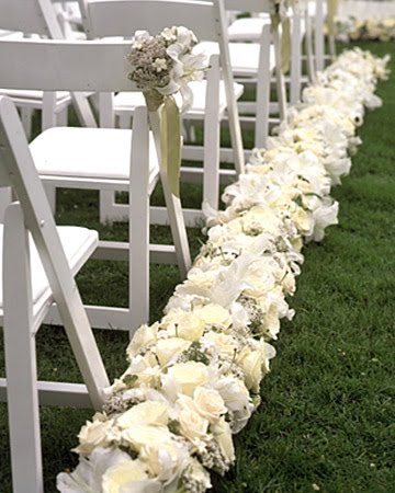 stephanotis and yarrow flanking the wedding ceremony aisles stephanotis and yarrow flanking the wedding ceremony aisles