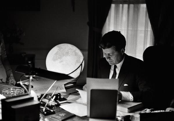 President John F. Kennedy at work in the Oval office in 1962.