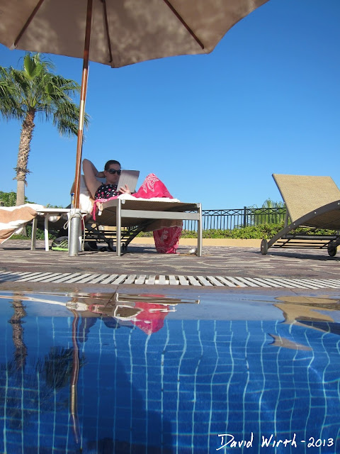 relaxing by the pool, mexico all inclusive resort