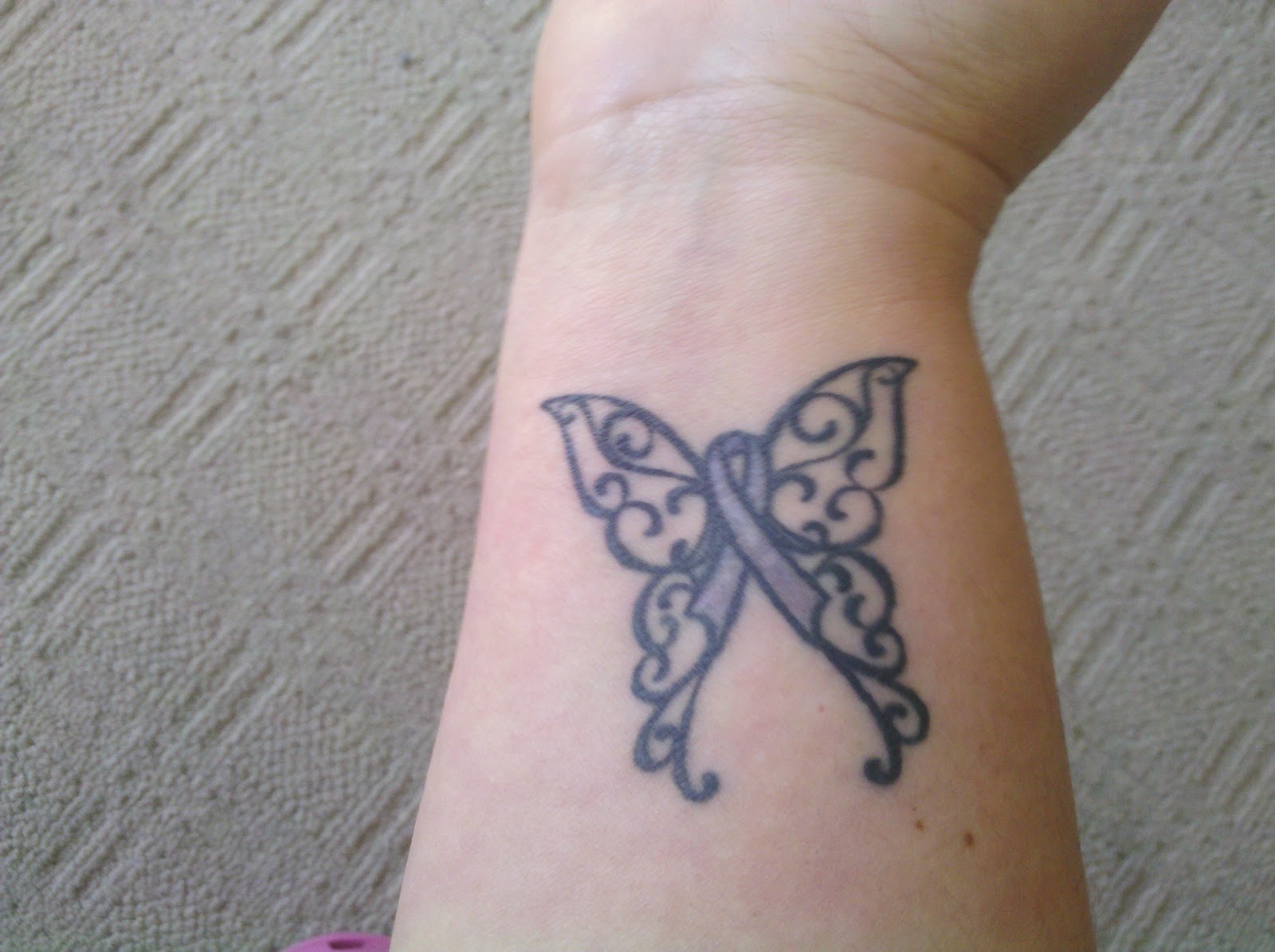 http://1.bp.blogspot.com/-pOC9I6sEg5k/T38mJBiCvzI/AAAAAAAADO4/7G6T0SKjJPc/s1600/butterfly+tattoo.jpg