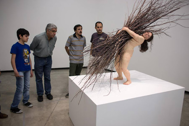 hyperrealistic sculpture by Ron Mueck