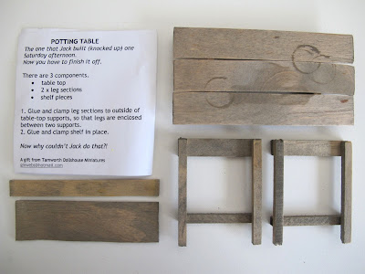 Dolls' house miniature potting table kit, components laid out, with instructions.