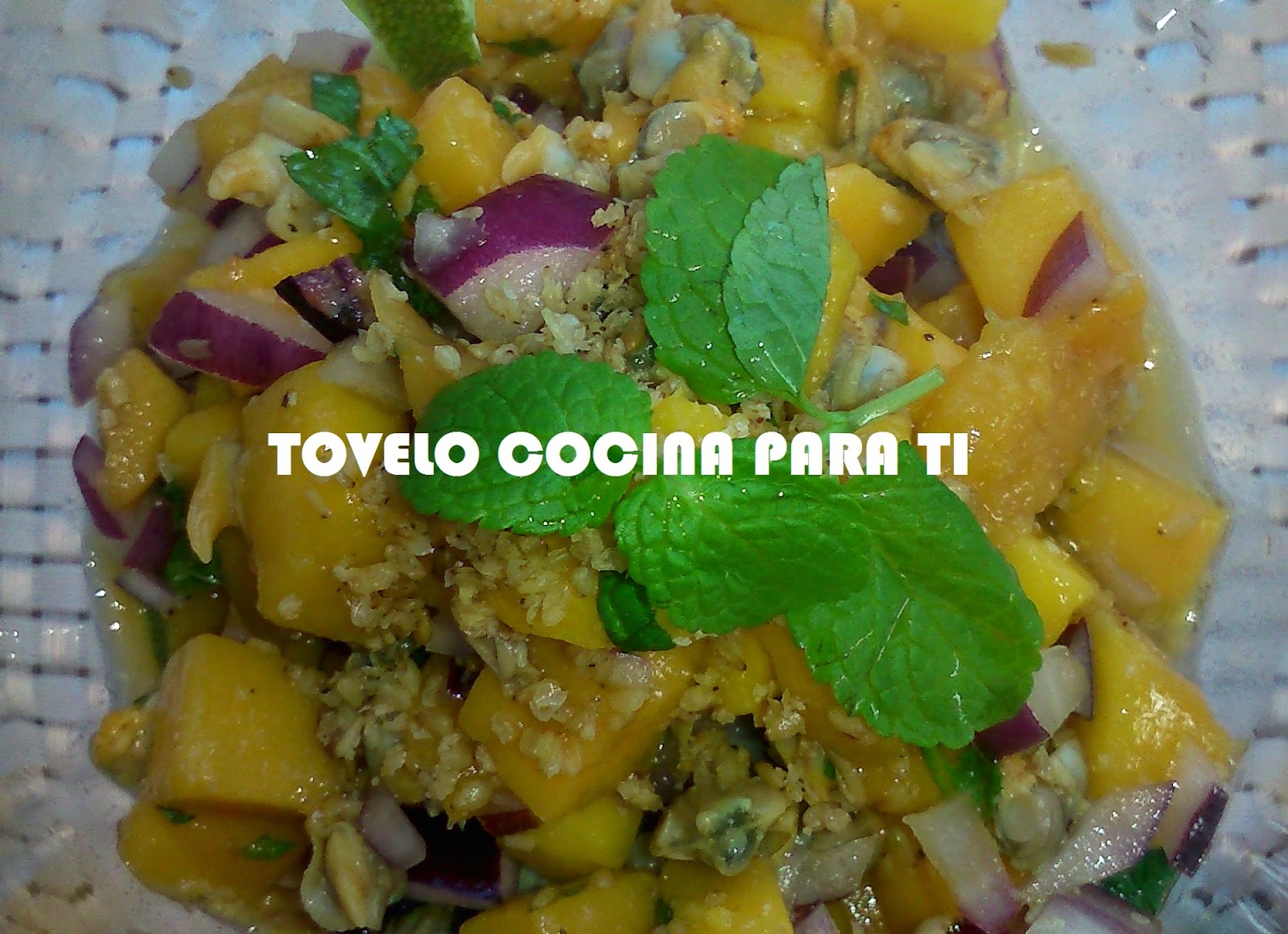 Aperitivo De Berberechos A La Menta Con Mango