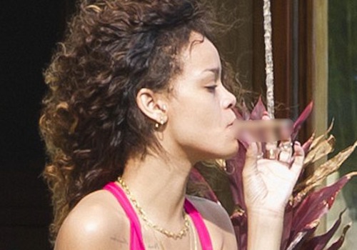 Rihanna was seen smoking on something that resembled a marijuana blunt