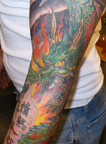Tribal Dragon Tattoos On Arm. hot wallpaper Tribal Arm