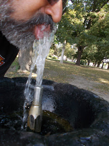 Drinking fresh natural mineral water at Bratislava Castle complex ground.