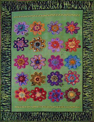 Memories, a wall quilt by Roberta Roberts, embroidery on wool applique