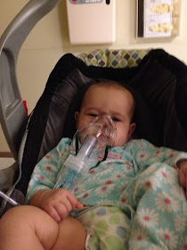 baby with a breathing mask