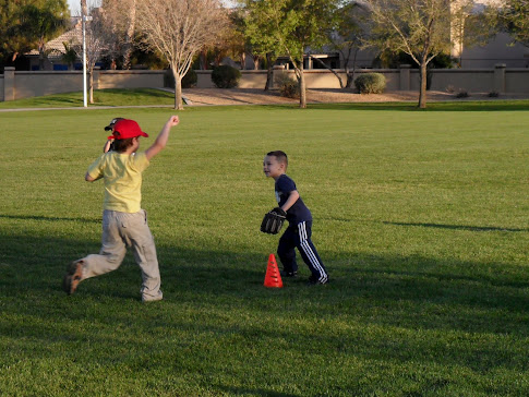 LOGAN WORKIN IT AT TBALL