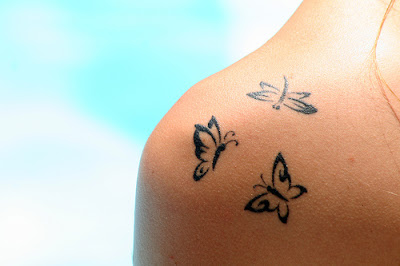 tatuagem, costa , ombro,simbolismo