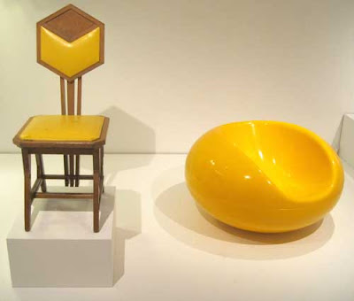 Yellow stilted uncomfortable-looking chair and yellow plastic sensuous chair