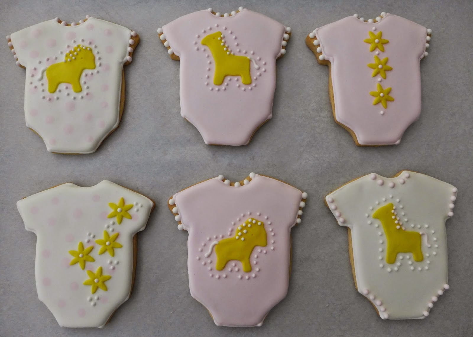 Dough and Batter more baby onesie cookies and elephants