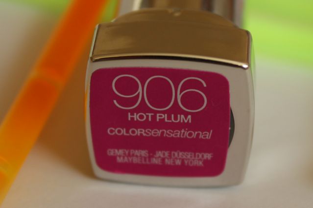 A Photo of Maybelline Color Sensational Vivid Lipstick in Hot Plum 