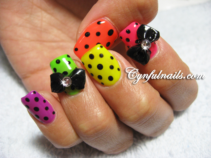 Some funky nail designs. NEON colors! :D. Hot pink and black combination
