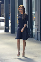Victoria Beckham leggy in black dress