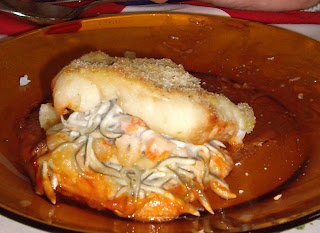 Merluza Rellena De Langostinos Y Gulas.
