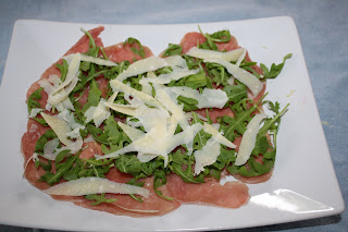 ricetta carpaccio rucola grana