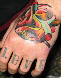 Hand Tattoo Pictures - Hand Tattoo Design Ideas