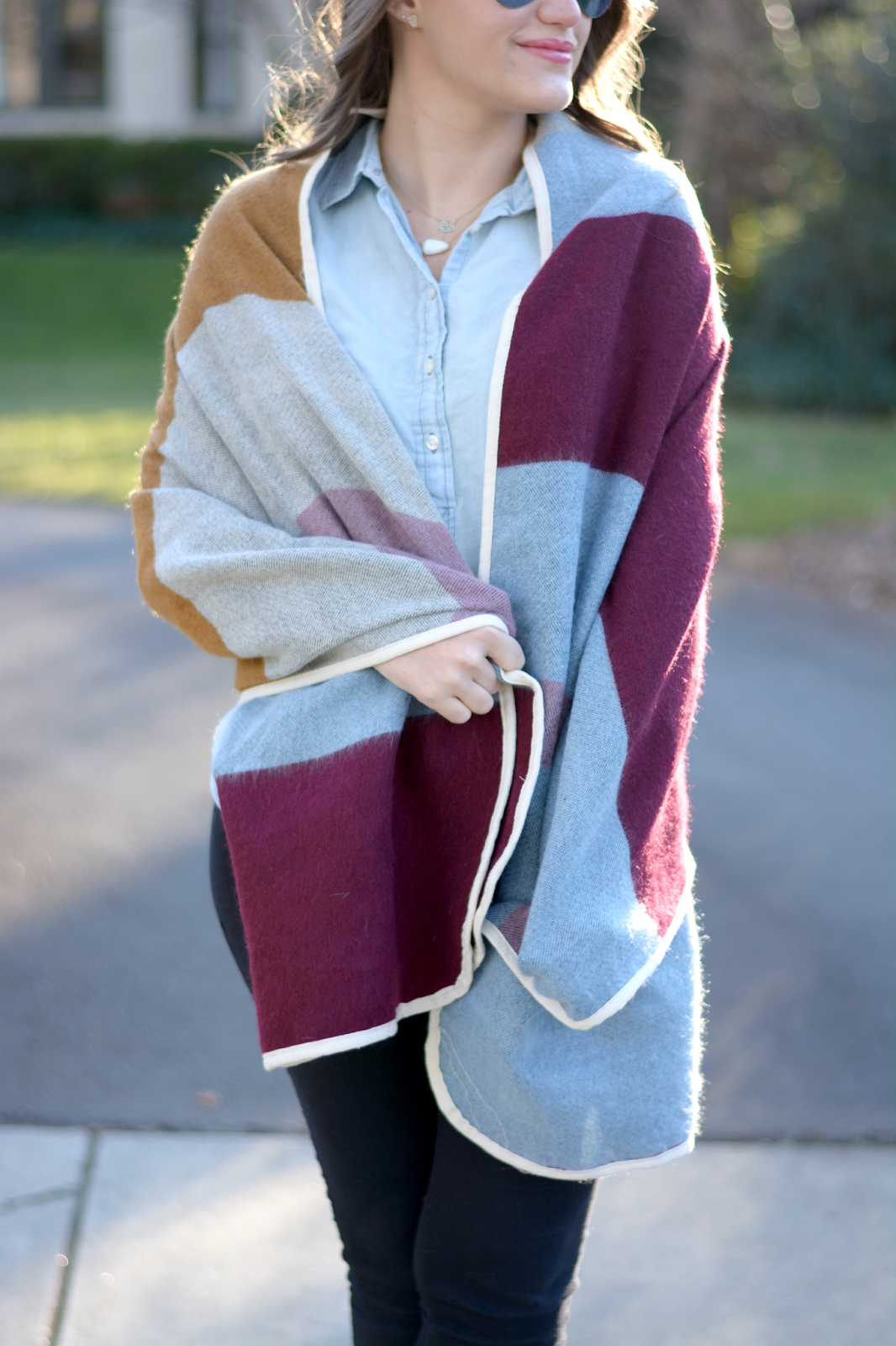 Multicolor Blanket Cape and Black Skinny Jeans New York City Fashion