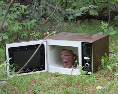 head sculpture in an oven