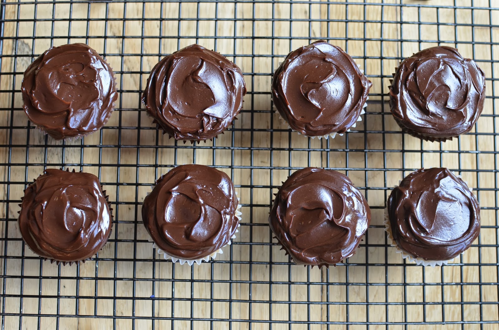 Playing with Flour Almondhazelnut cupcakes with ganache frosting