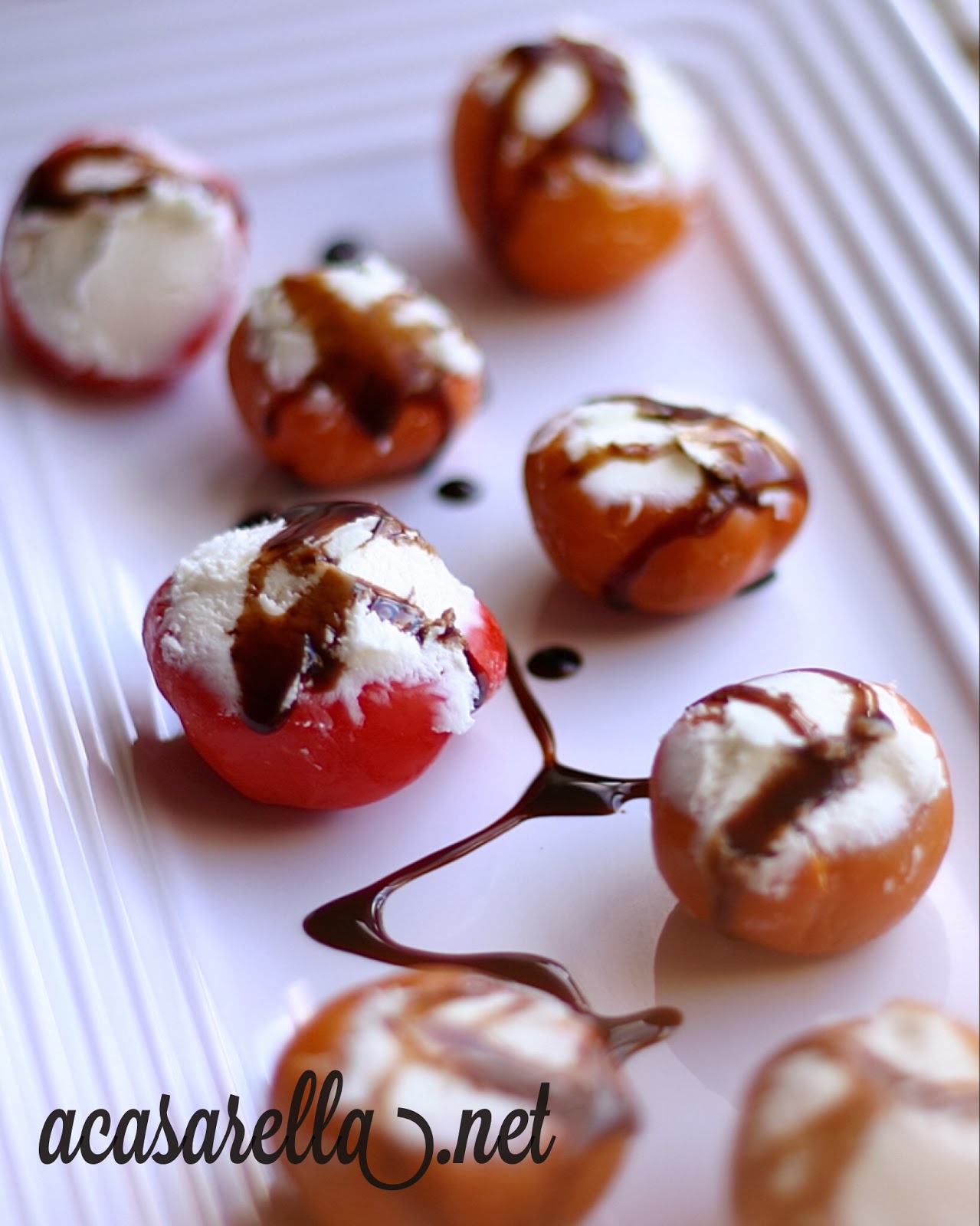 Goat Cheese Stuffed Peppadews with Balsamic Glaze 'A Casarella
