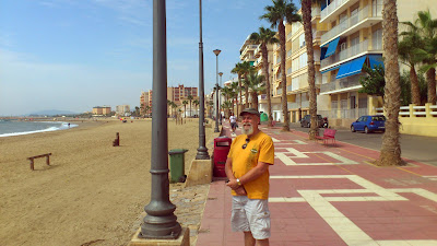 David enjoys his pipe on Aguilas promenade