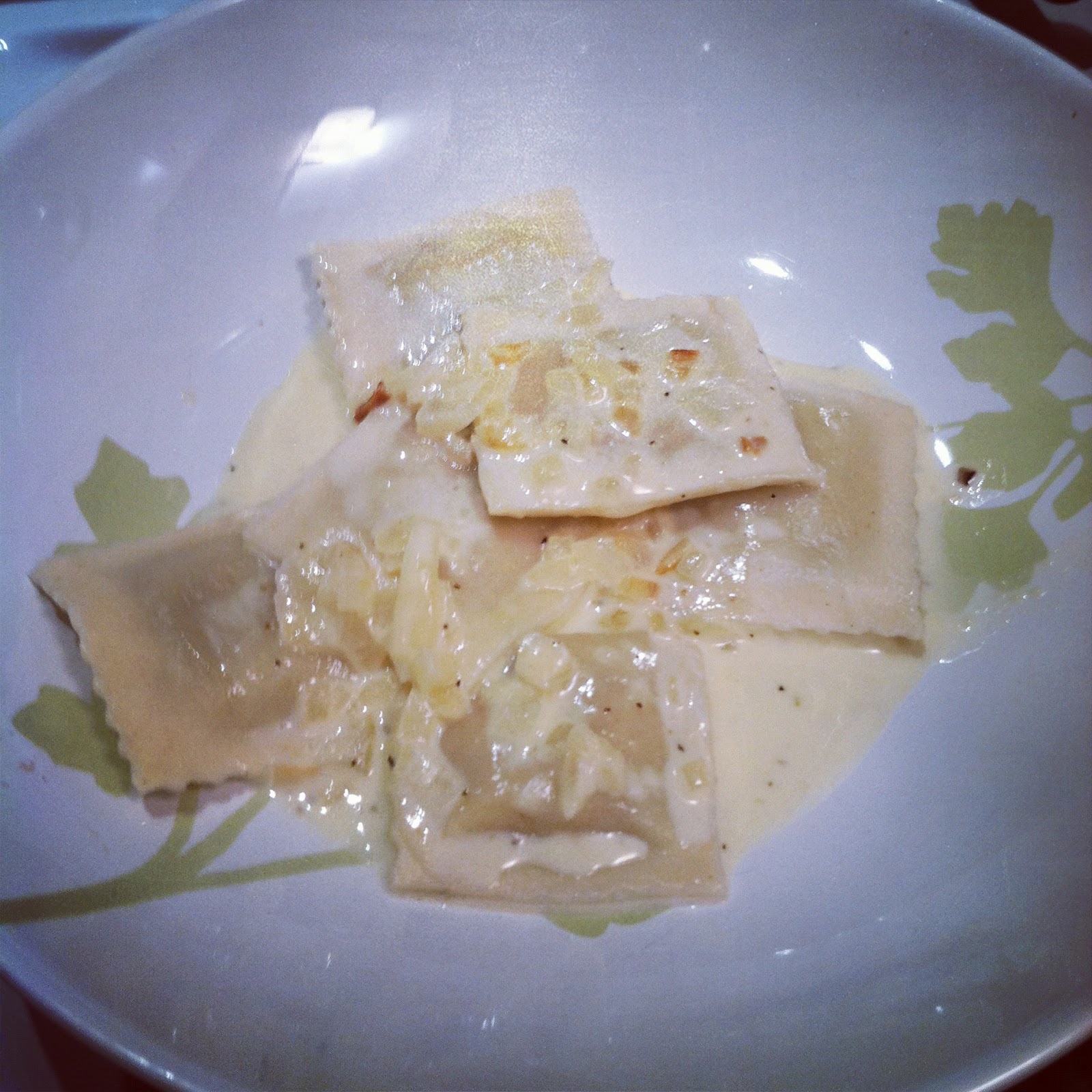 Quest for Delish Ravioli with Garlic Wine Cream sauce
