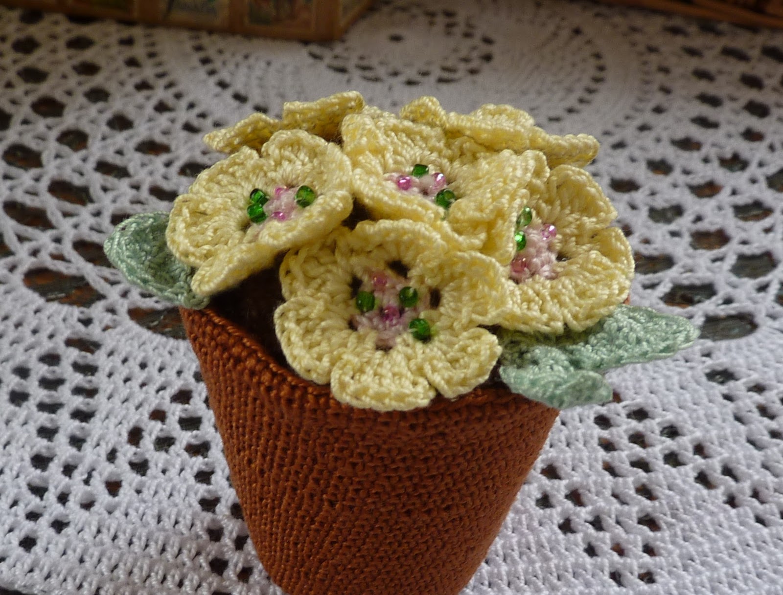 Yellow, Pink and Sparkly Pot of Primroses