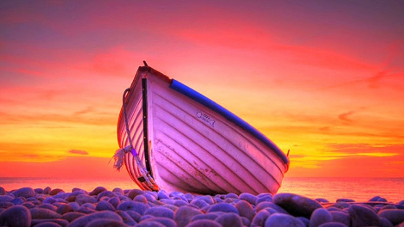 http://1.bp.blogspot.com/-r0yBUE_17SQ/UAa-feOWzQI/AAAAAAAACpc/K6ArHPrkWDE/s1600/boat-on-the-beach-with-sunset-behind-it.jpg