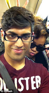Pictures Of Rihanna riding the London tube with her fans: Damn she couldnt even get a seat. 6