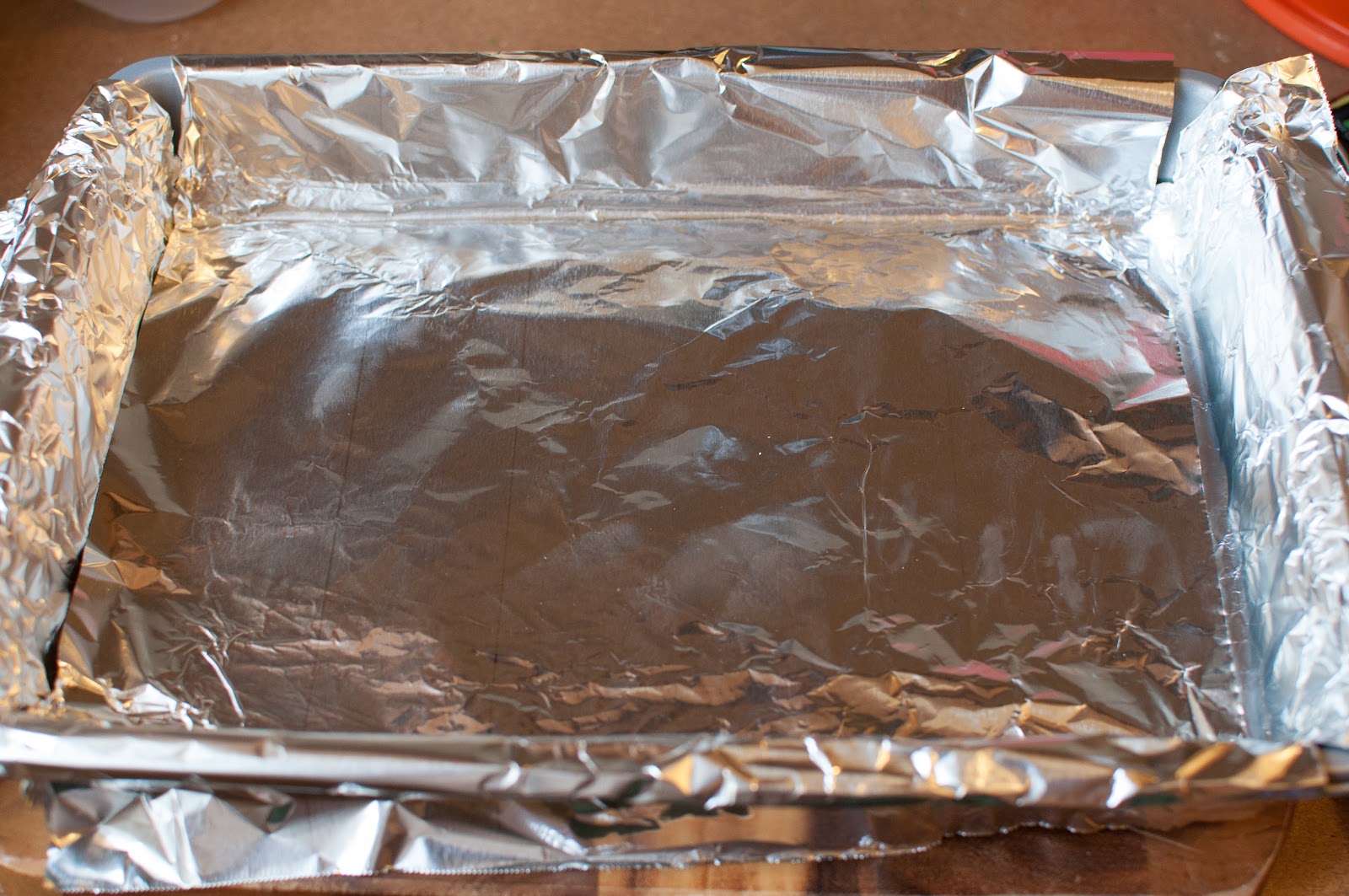 not quite gourmet chocolate walnut brownies baking sheet with foil